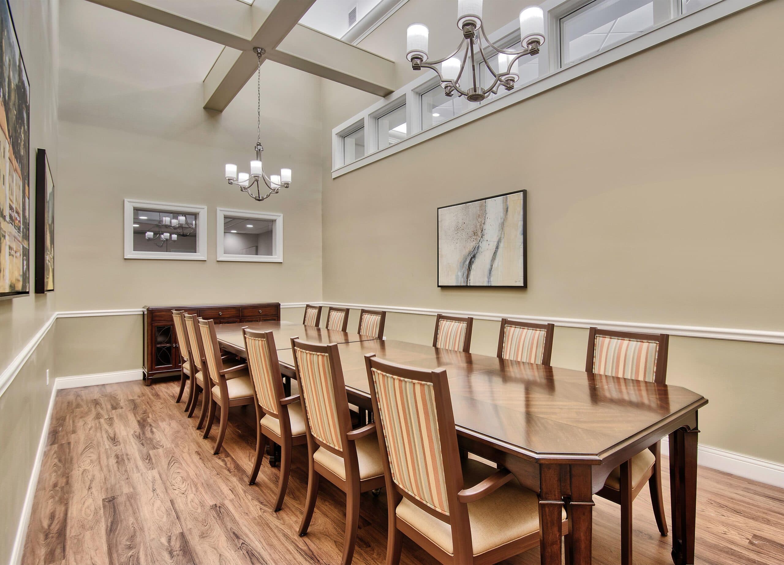 Long table in a long room with high ceilings