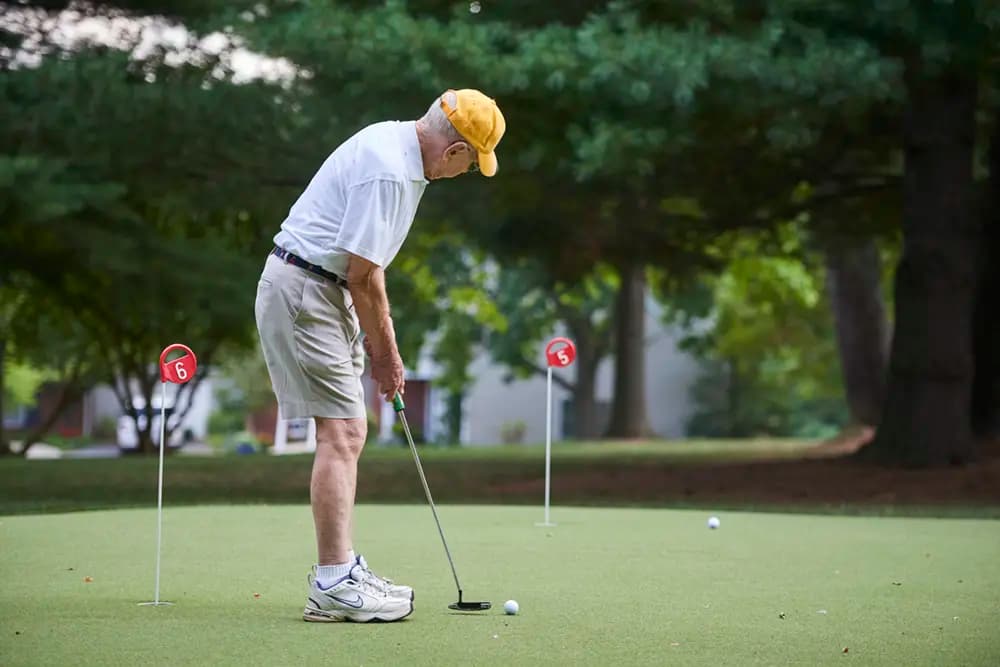 Man practicing putting