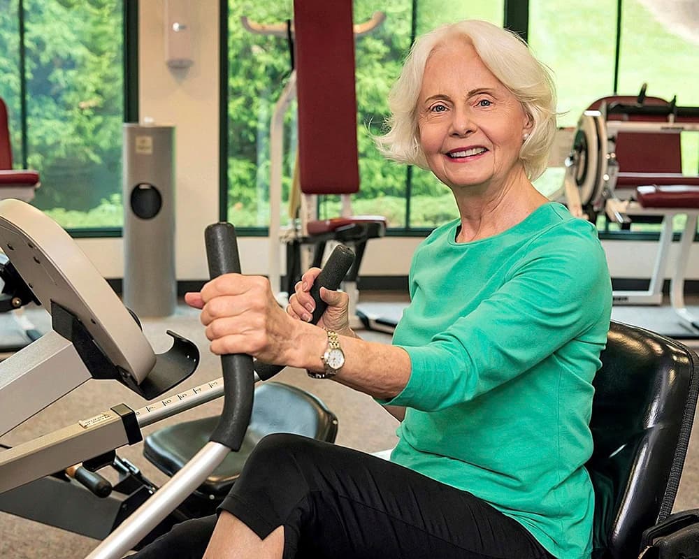 Woman using exercise equipment